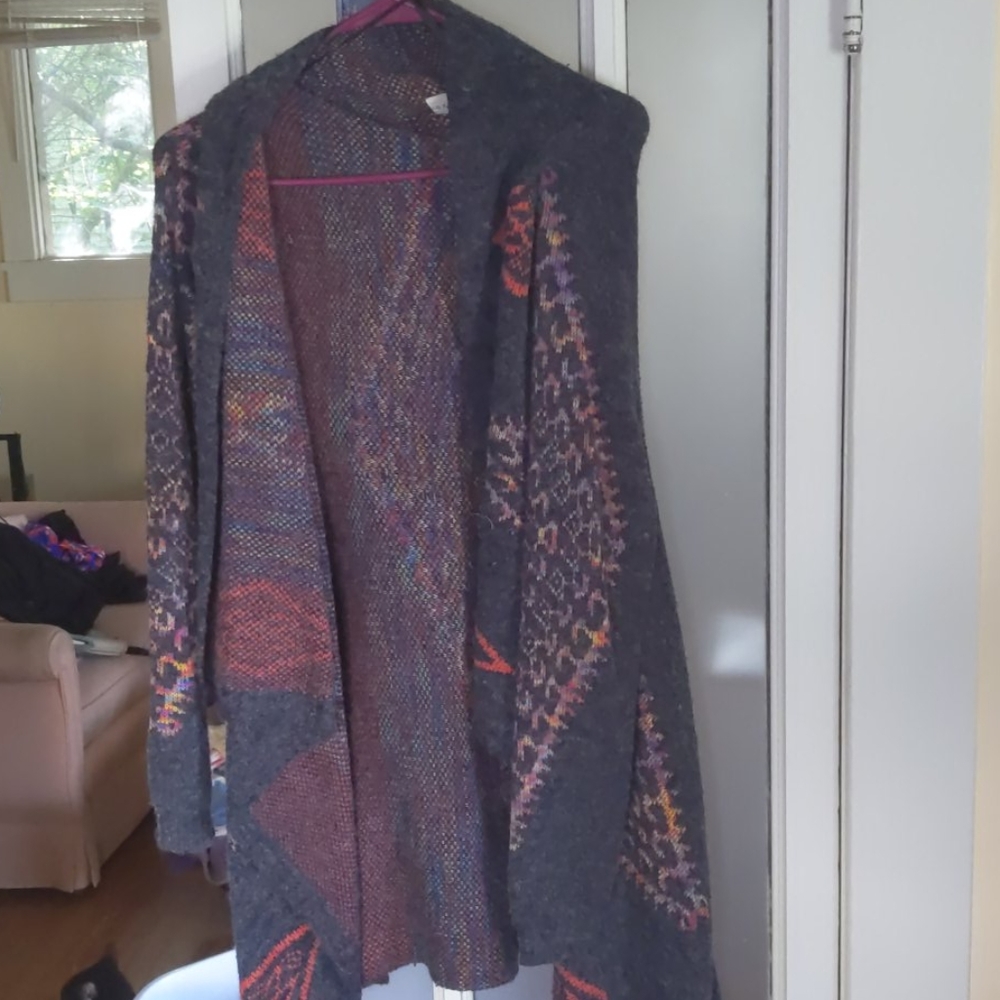 Long sleeved asymmetrical sweater